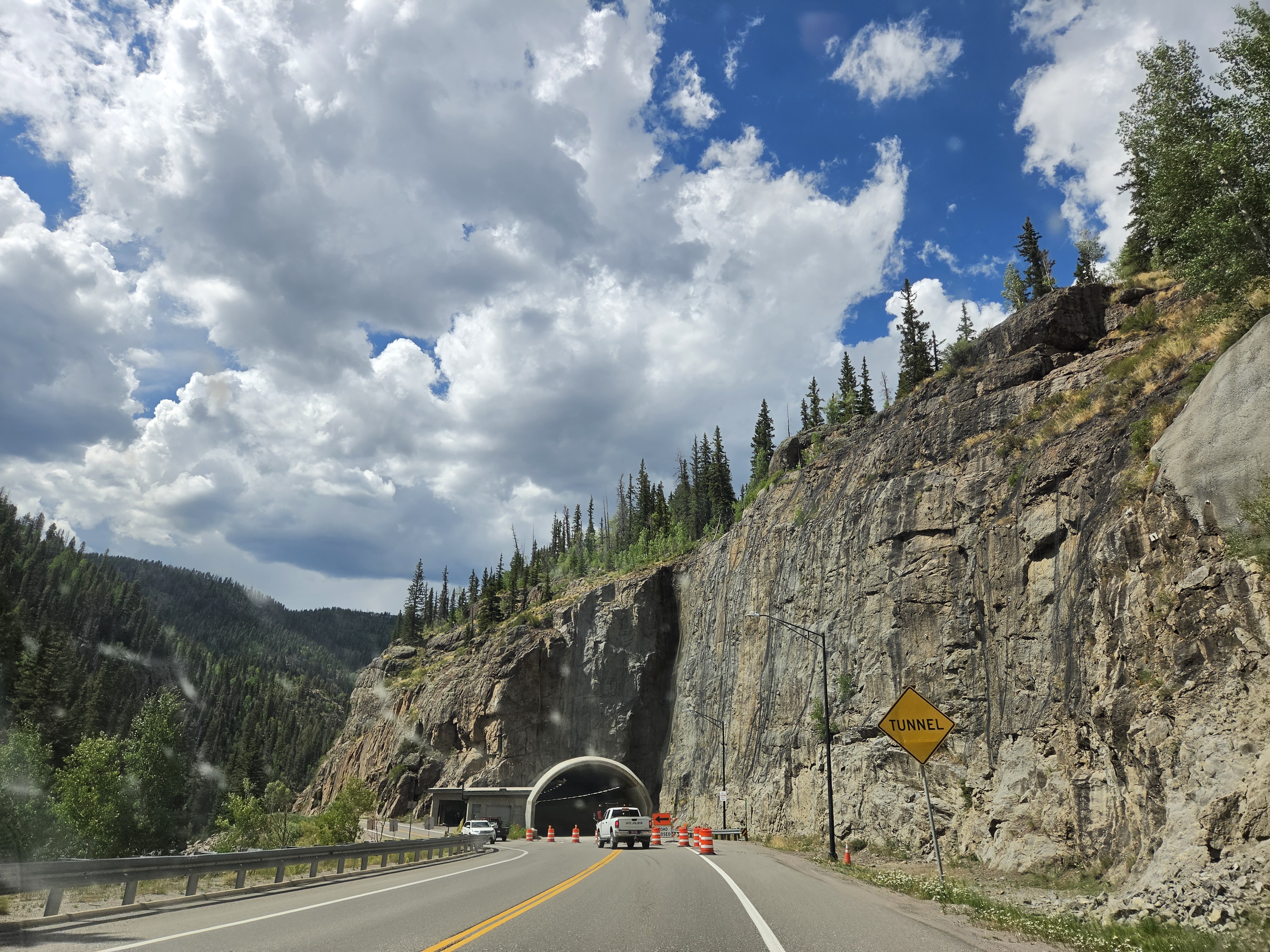 US-160 approaching the tunnel on Wolf Creek Pass, rock cliffs on both sides